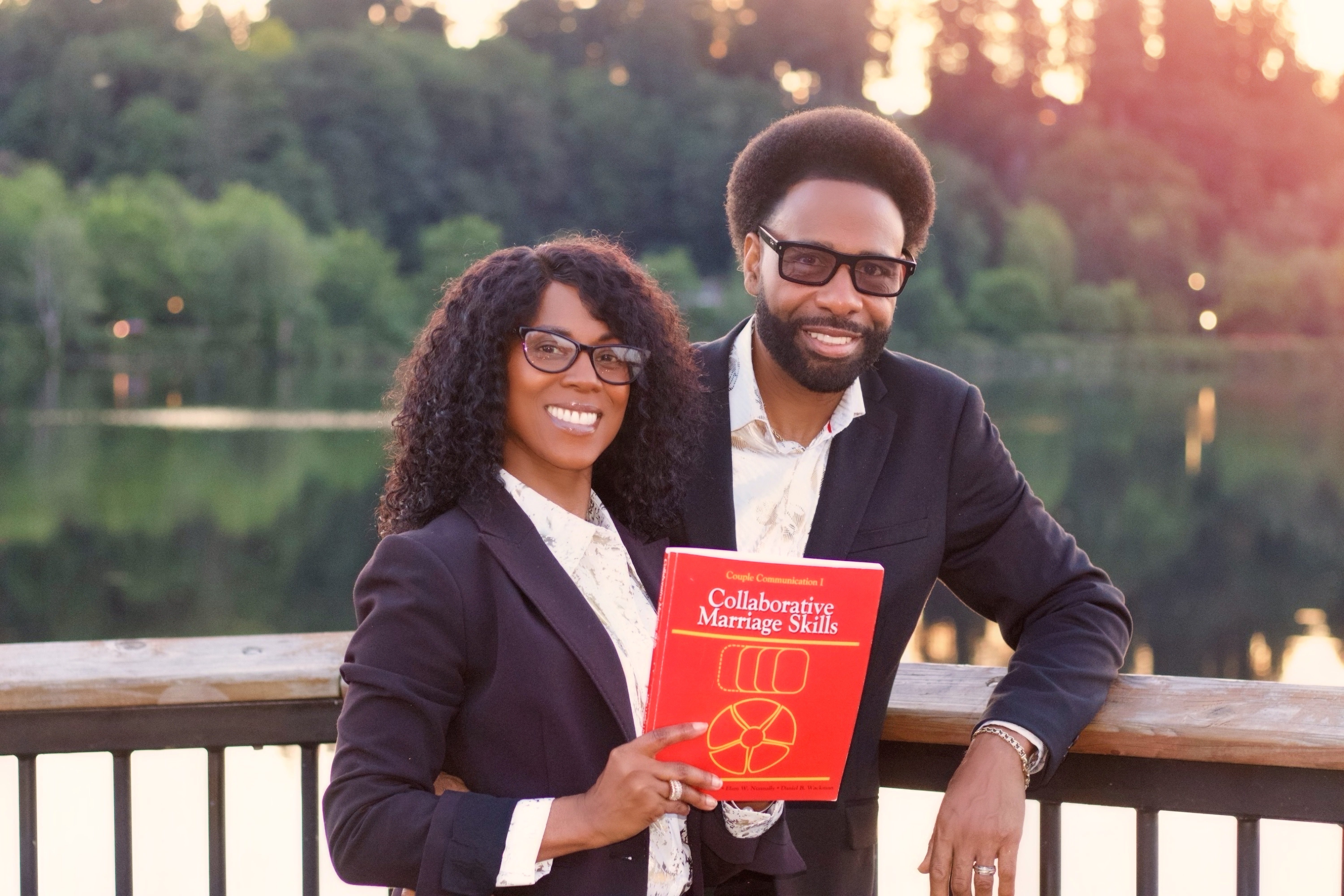 Micah and Antoinette Hardeman holding the Collaborative Marriage Skills book